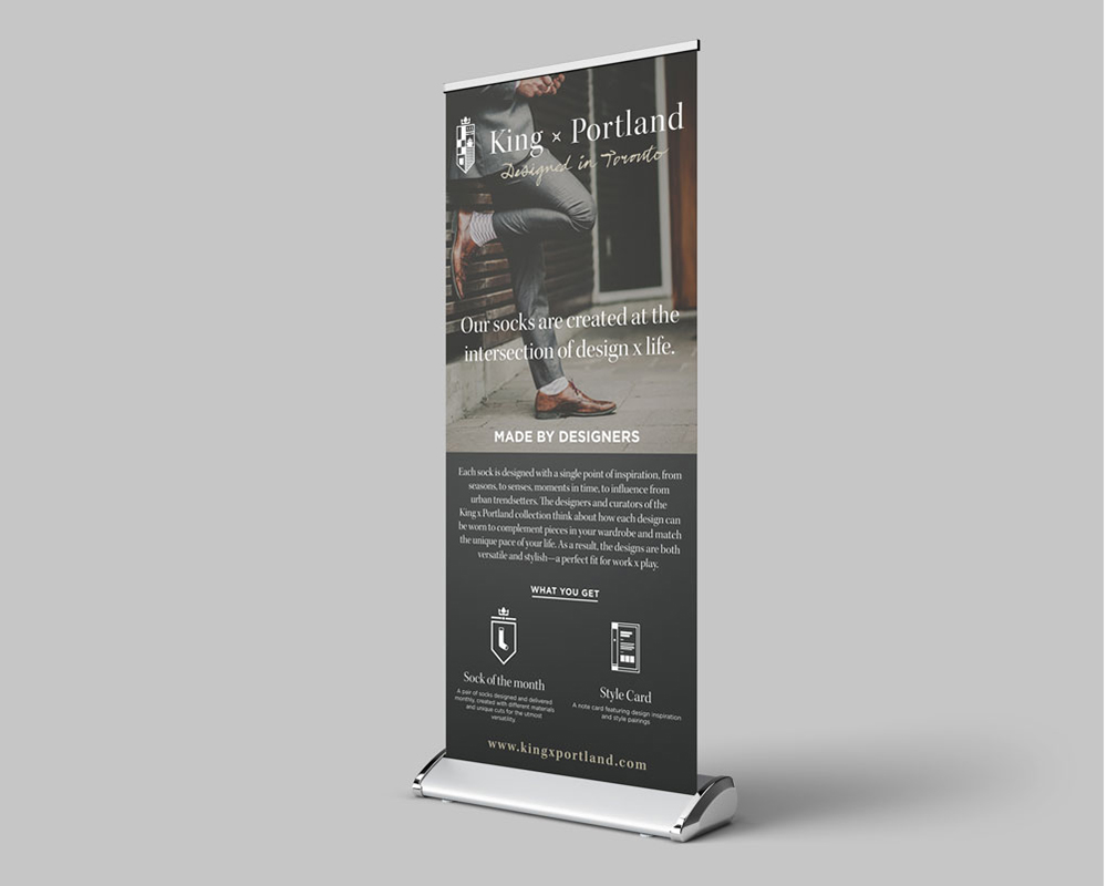 Retractable banner stand advertising men's socks