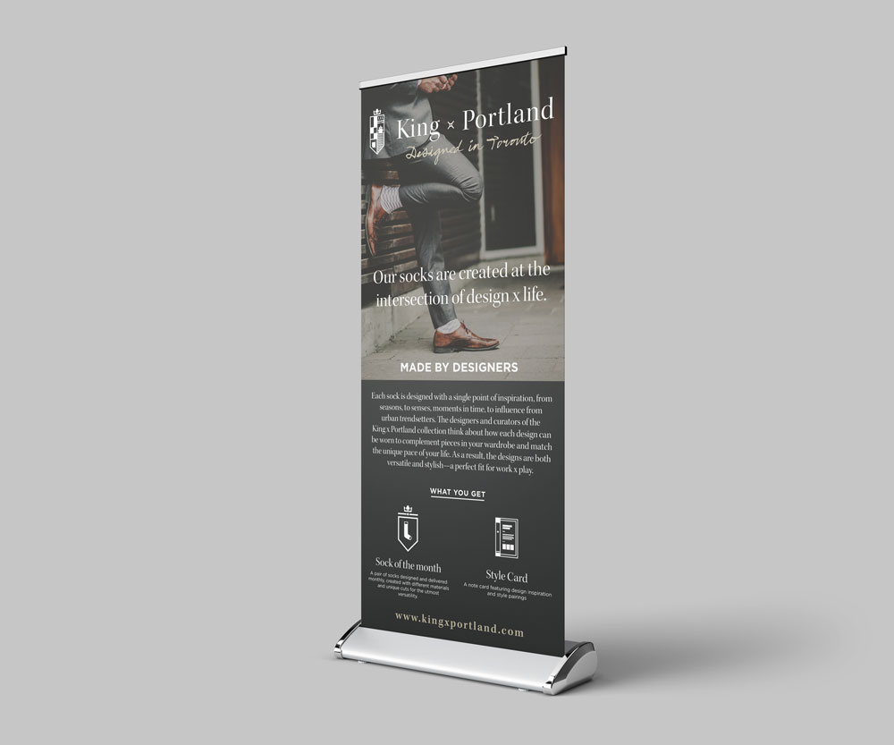 Retractable banner stand advertising men's socks